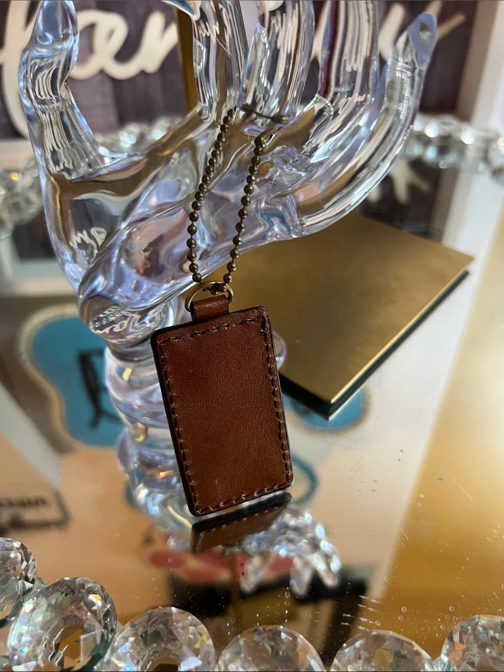 Etienne Aigner vintage  brown leather and brass logo hangtag keychain